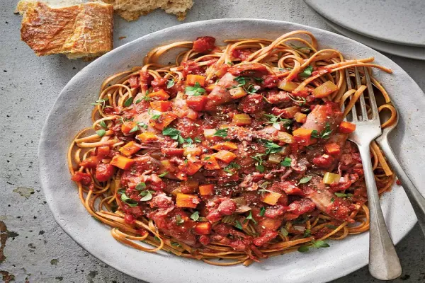 Slow Cooker Octopus with Red Wine Sauce Over Linguine