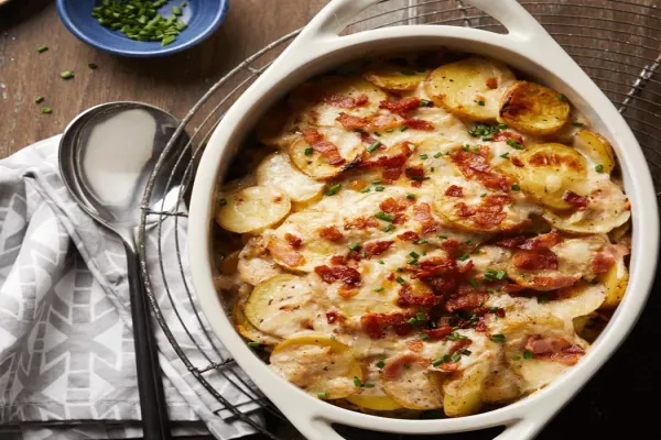 Loaded Scalloped Potatoes with Bacon Cheddar & Chives