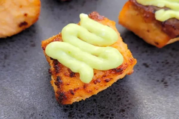 Air Fryer Spicy Salmon Bites with Avocado Lime Sauce